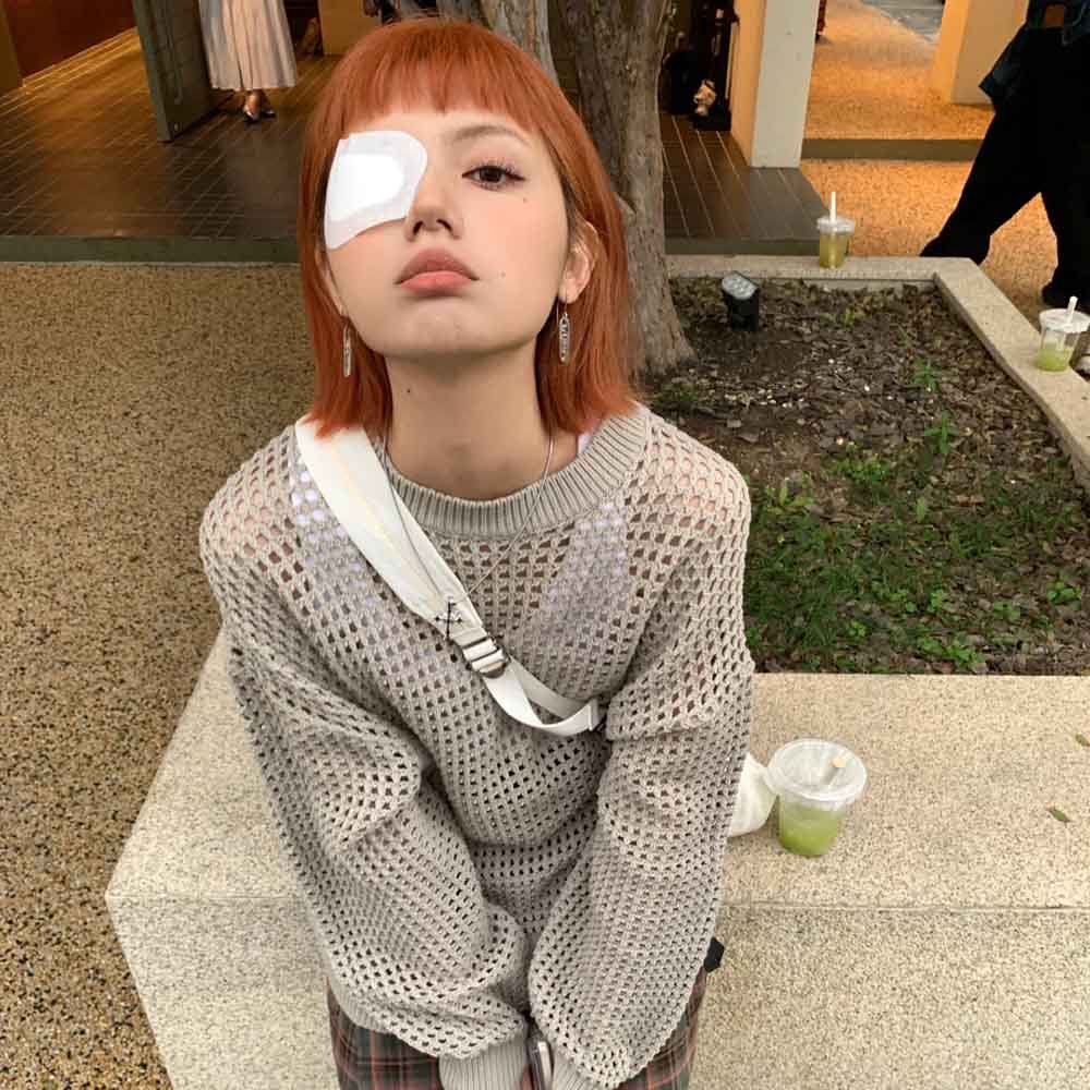 Young Female Client with Post-Extension Stye Applying Therapeutic Eye Patch