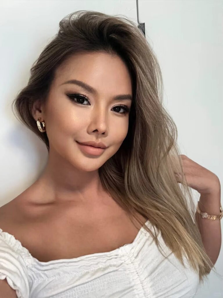 A glamorous young Asian model reveals her stunning, enhanced beauty after her Shewincosmetic lash extension application