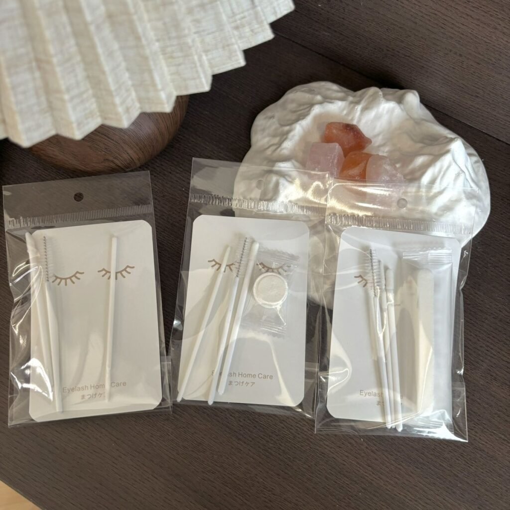 Shewincosmetic's Customizable Eyelash Extension Kit and Aftercare Kit with white logo insert cards