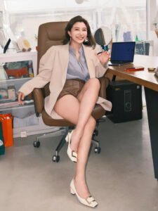 Living the dream as a lash business owner – a young woman confidently managing her studio built through Shewincosmetic's lash training